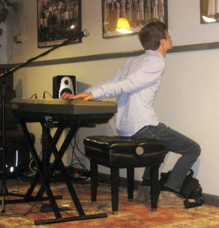 Musician Mac Potts shows off his flexibility and range during a July 3 performance at Washougal Times.
