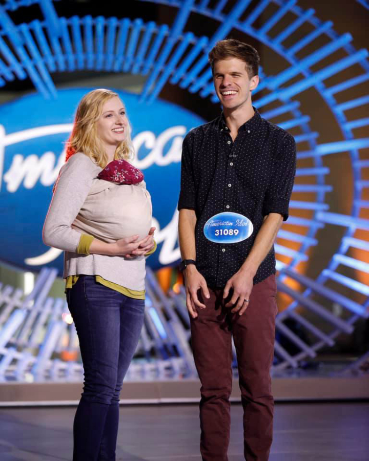 Mac Potts stands with his wife, Hailey Potts, and their daughter, Aria, on the "American Idol" stage.