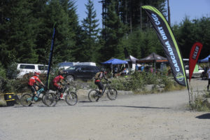 Enduro mountain bike racers pull into base camp at the Cold Creek Day use area during the Yacolt Burn Enduro race on Saturday, July 20. (Photos by Wayne Havrelly/Post-Record)