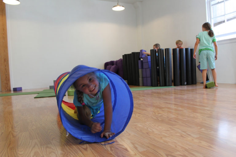 Children play at a summer yoga camp held at Body Bliss yoga studio in downtown Camas on July 26.