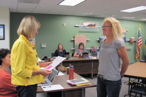 Dawn Tarzian, former Washougal School Board superintendent (left), administers the oath of office to Teresa Lees (right) in October 2014. Lees has represented the board's District 1 seat since then, but recently said she will not seek re-election. (Post-Record file photo)