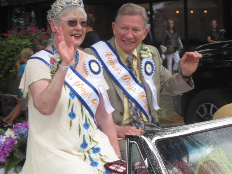 (Post-Record file photo) Barbara Carpenter and Chuck Carpenter, the 2019 Camas Days queen and king, wave to the crowd during the Camas Days Grand Parade on July 27, 2019. This year's Camas Days celebration is canceled, but the General Federation of Womens Club, Camas-Washougal is still taking nominations for the 2020 Royal Senior Court through May 25.