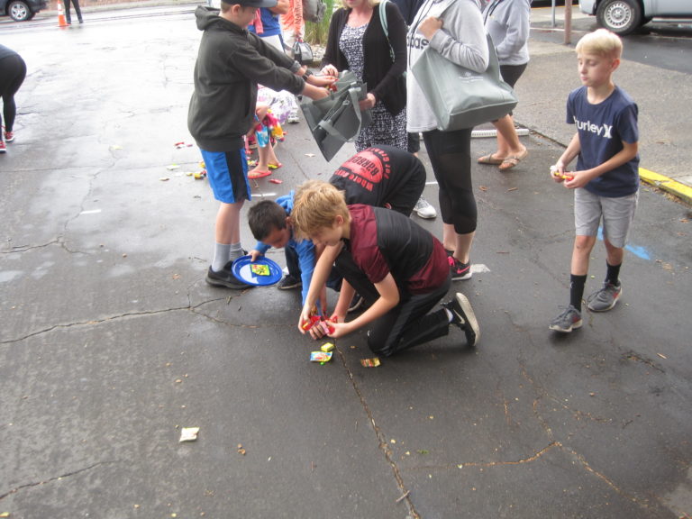 The Camas Days Grand Parade's theme was "Candyland," and children eagerly scooped up candy that was tossed to the sidewalks on Saturday, July 27.
