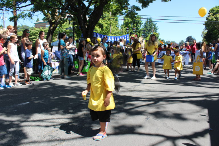 (Photo by Kelly Moyer/Post-Record) A child makes his way down Northeast Fourth Avenue in Camas during the 2019 Camas Days Kids Parade on Friday, July 26. 