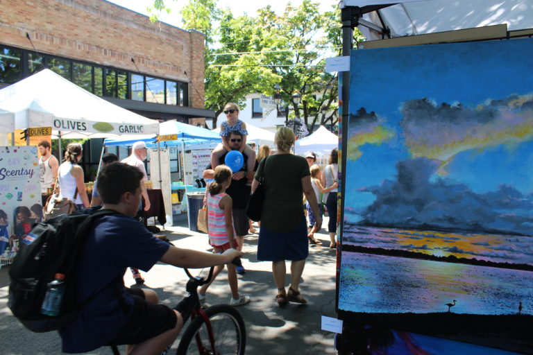 (Photo by Kelly Moyer/Post-Record) Crowds pass by vendors on Northeast Fourth Avenue in downtown Camas on Friday, July 26, during the first day of the 2019 Ca
mas Days celebration.