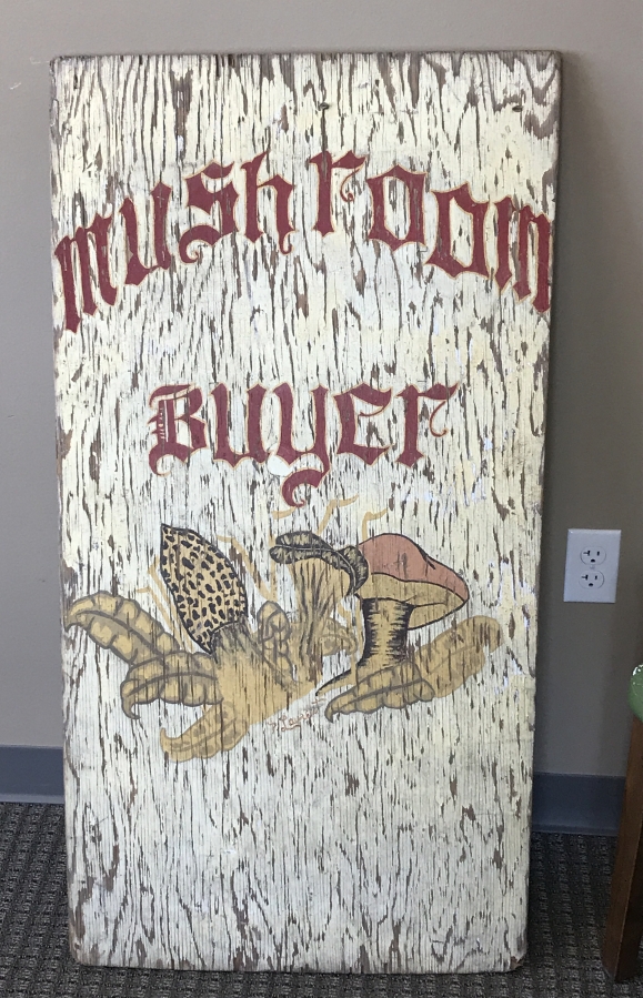 The first sign that John and Wanda Anderson used to sell mushrooms in the early 1980s sits in the Foods In Season main office building in Washougal.