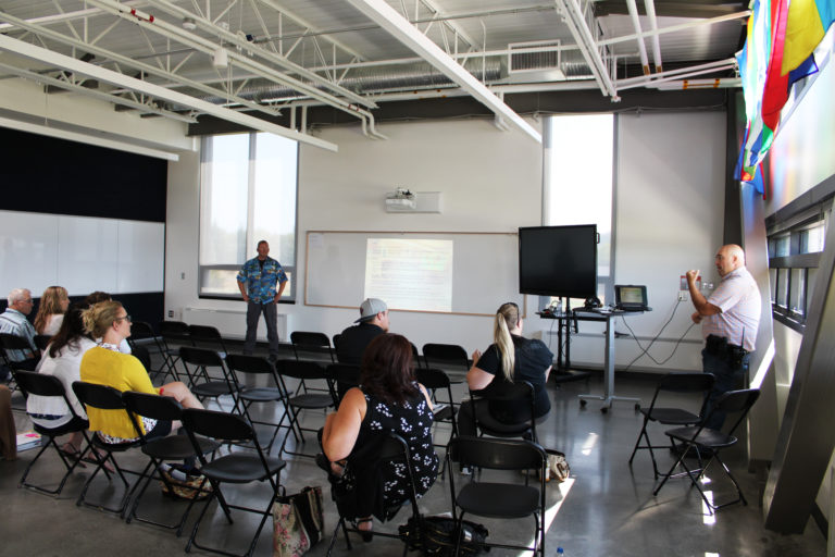 Clark County Sheriff’s Office deputies Shaun Robertson (left) and Aldin Boyse (right) teach an active threat response course to school leaders at Discovery High School in Camas on Monday, Aug. 5, as part of the 2019 School Administrators’ Emergency Training Summit.