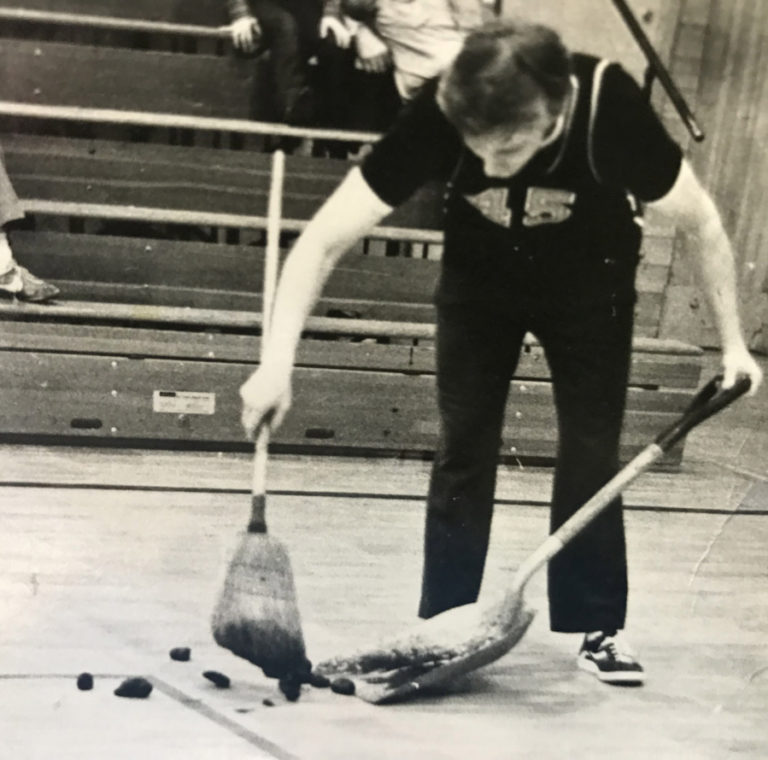 Not afraid to do the dirty work, George Cass cleans up after the basketball-playing donkeys at Washougal High School in the mid-1980s.