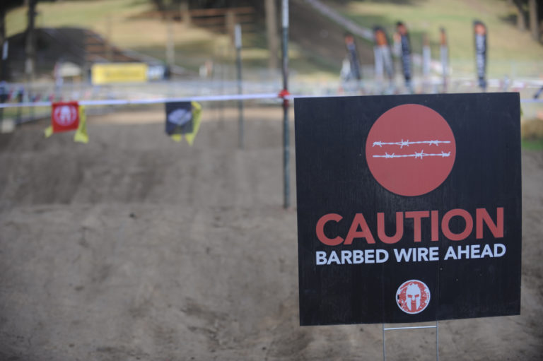 Motocross &quot;whoop-de-dos&quot; are transformed into a barbed-wire obstacle course for Spartan races.