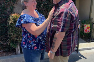 Washougal resident Melanie Ausmus meets her birth father, John Coulter, for the first time Aug. 10 in Claremont, Calif. (Contributed photo courtesy of Melanie Ausmus)