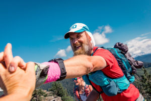 Ultramarathon runner Dave Stinchfield starts to celebrate at 185 miles into a 206.5-mile trail running race around Mount St. Helens. on Aug. 13.