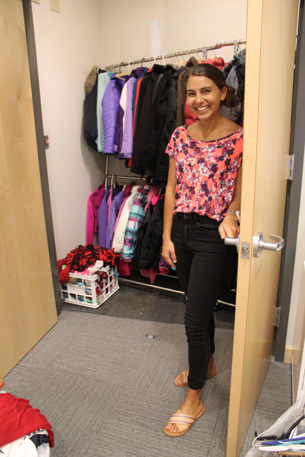 Olivia Eagle shows a clothing closet inside the Camas School District&#039;s Family-Community Resource Center.