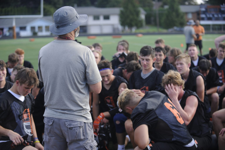 Wayne Havrelly/Post-Record
Washougal High School football coach Dave Hajek rallies his team moments after intense training drills on a 95-degree late August afternoon.