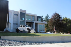 (Photo by Kelly Moyer/Post-Record) Visitors walk toward The Nakshatra home, by Axiom Luxury Homes, during the first day of the 2019 NW Natural Parade of Homes on Friday, Sept. 6, at Dawson's Ridge in Camas. 