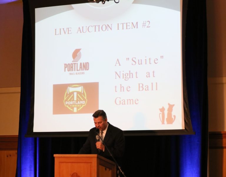 Post-Record file photo 
 Master of ceremonies Wayne Havrelly auctions a prize at the &#039;A Tail To Remember&#039; event last year. The event, which will be held again Oct. 12, raises funds for the West Columbia Gorge Humane Society.
