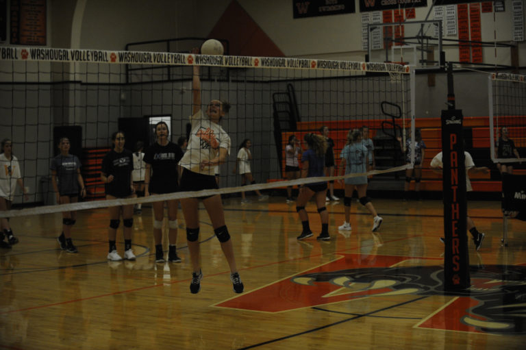 Washougal High School sophomore Jaiden Bea practices her spiking technique during a recent practice session. Bea played soccer last year, but she decided to return to volleyball, which she played in eighth grade.