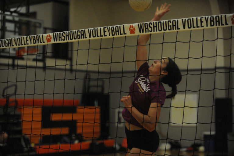 Washougal High School junior Skylar Bea rises high over the net during a recent practice session.