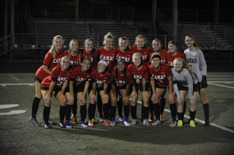 The Camas High School girls soccer squad is all smiles after it posted a 7-0 win over Reynolds (Ore.) High School on Sept.