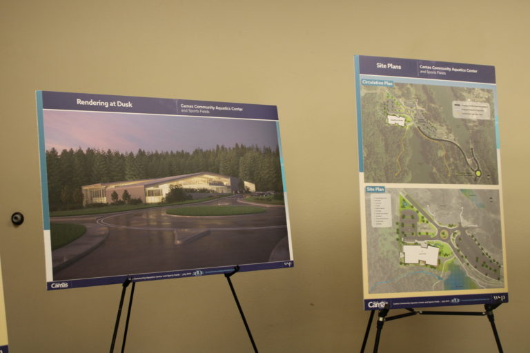 Illustrations displayed at the 2019 Camas State of the Community address at Lacamas Lake Lodge show what a future Camas Community and Aquatics Center might look like (left) and where it might be sited (right).