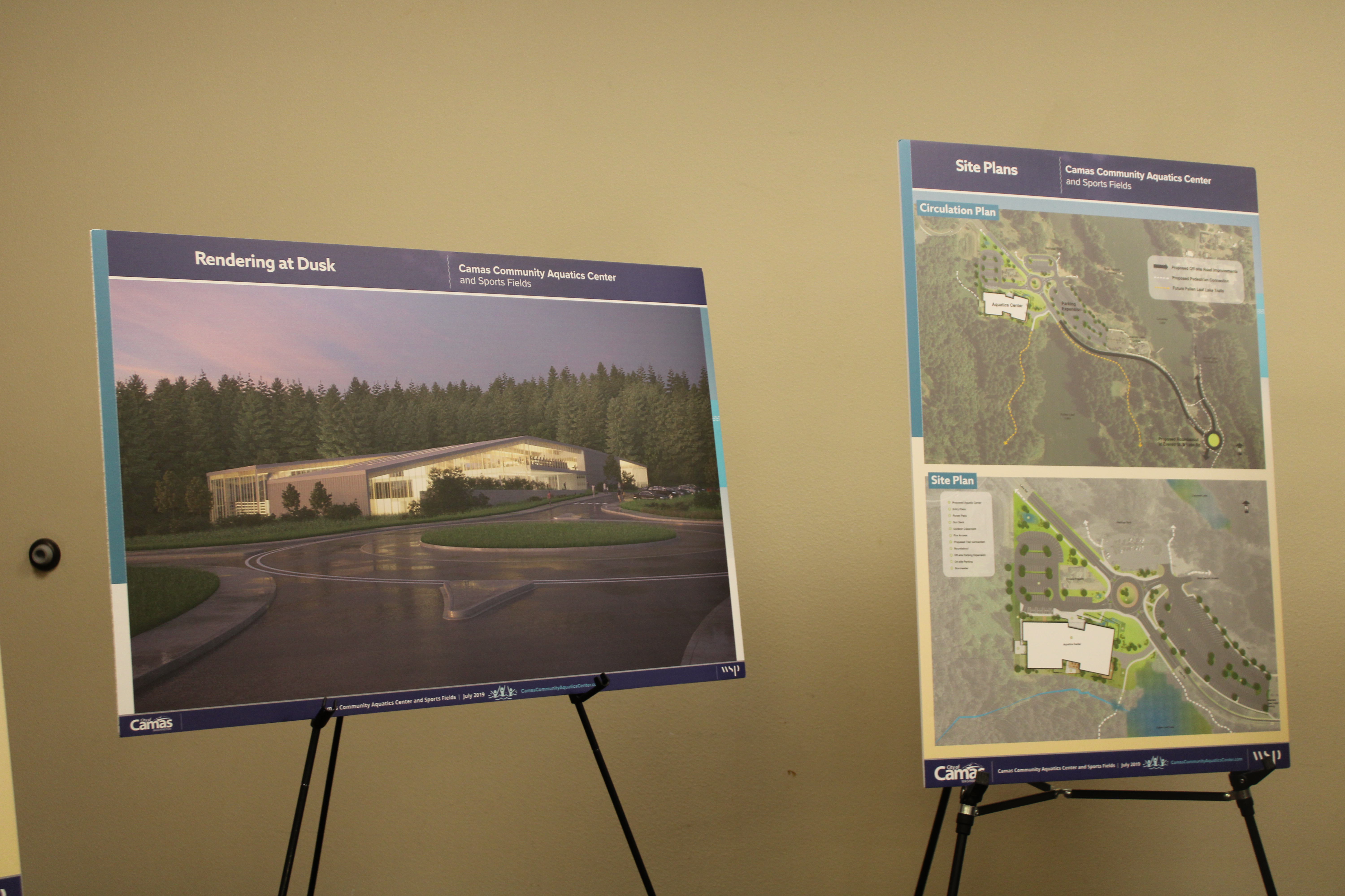 Illustrations displayed at the 2019 Camas State of the Community address at Lacamas Lake Lodge show what a future Camas Community and Aquatics Center might look like (left) and where it might be sited (right). 