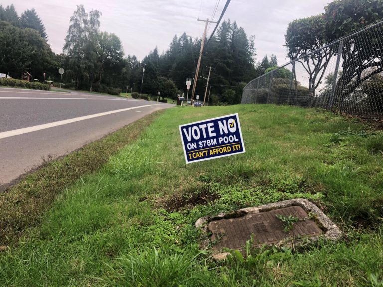 "Vote No on $78M Pool" signs are going up around Camas in response to the city's $78 million bond proposition on the November ballot, which would build a community-aquatics center with two pools, athletic courts, community rooms and exercise equipment, as well as improve sports fields throughout the city.