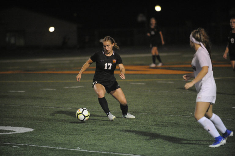 Washougal High School senior Payton Lindell looks to set up a teammate during the Panthers&#039; 6-0 win over R.A. Long at Fishback Stadium in Washougal on Sept. 17.
