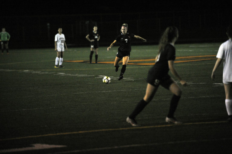 Washougal High School junior Lauren Snedeker takes a shot on goal during the Panthers&#039; 6-0 victory against R.A. Long at Fishback Stadium on Sept.