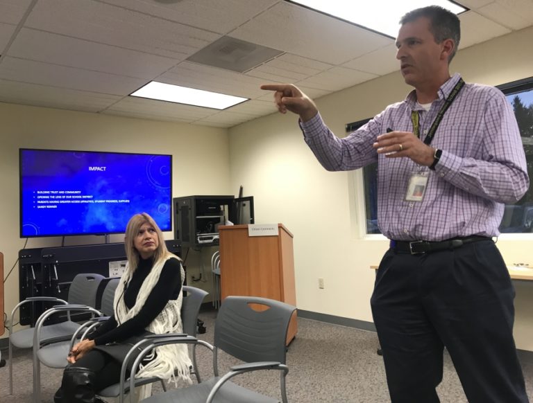 Jemtegaard Middle School principal David Cooke (right) talks about the Washougal School District&#039;s efforts to improve relations with the city&#039;s Spanish-speaking community at a board of directors meeting Sept. 24.