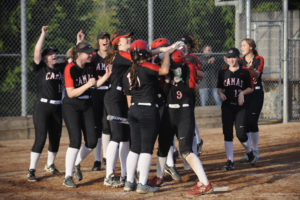The Camas High School slowpitch softball team celebrates its 8-7 win over visiting Washougal High School on Sept. 25.