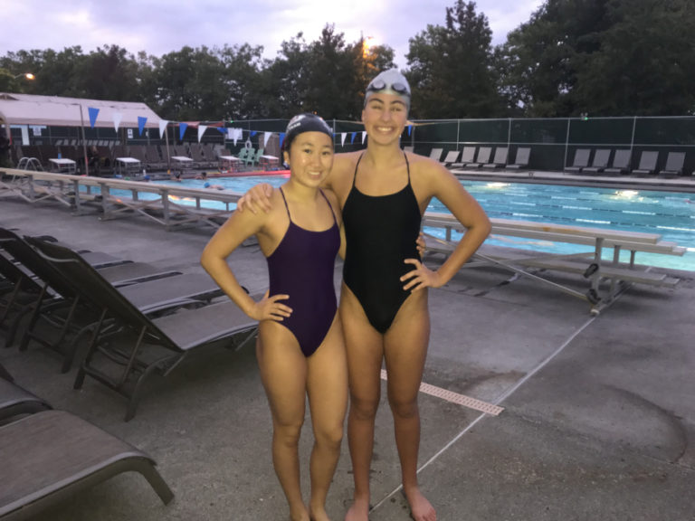 Camas High School girls swimming and diving co-captains Hope Yim and Bailey Segall say getting up at 4:30 a.m.