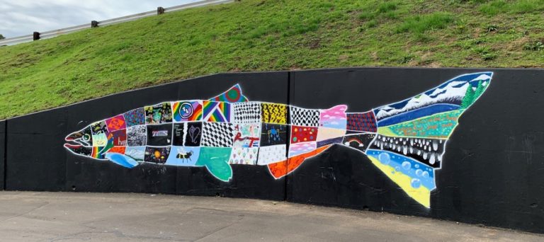 A group of students from Jemtegaard Middle School&#039;s Club 8 art group created this mural of a Chinook salmon, which they painted on the surface of an underpass in Washougal on Saturday, Oct. 12.