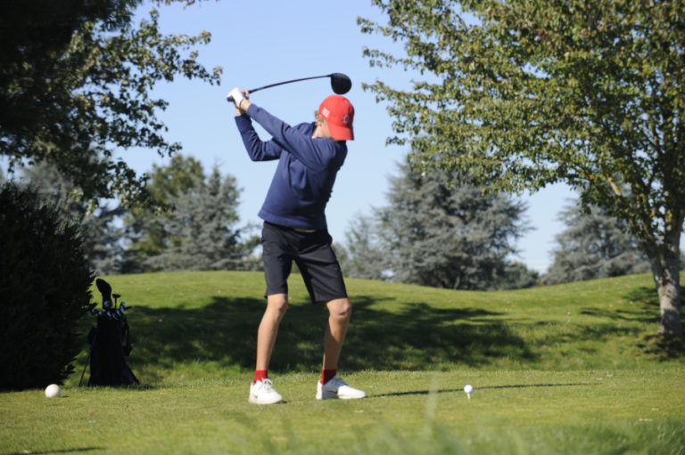 Camas High School folfer Eli Huntington tees off during the 4A District 4 tournament on Oct. 10.
