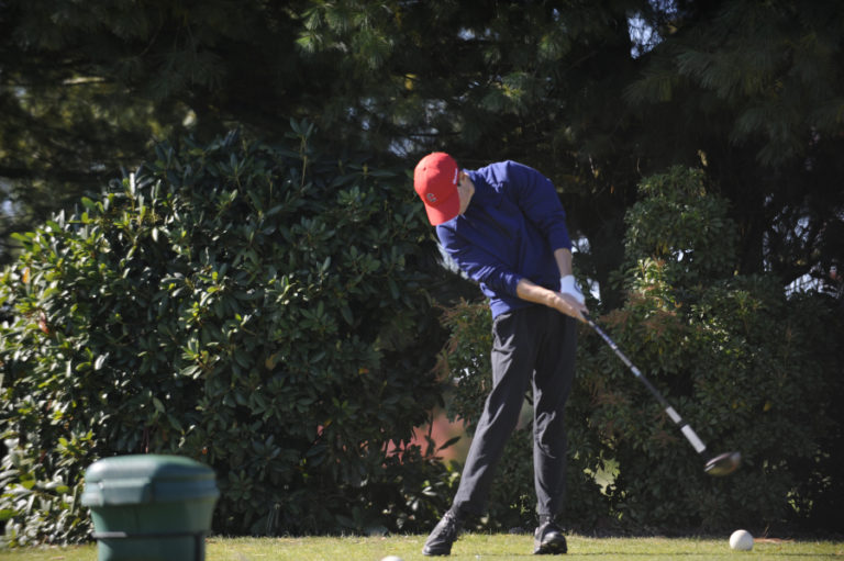 Camas High School golfer Owen Huntington drives the ball down the middle of the No. 7 fairway at Tri-Mountain Golf Course during the 4A District 4 championship on Oct. 10.