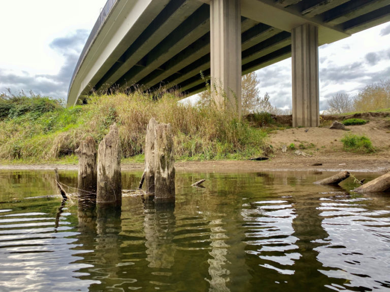 Kayakers should watch out for wooden pilings near the bridge leading into downtown La Center when paddling on the East Fork Lewis River from La Center&#039;s John Pollock Water Trail Park toward Paradise Point State Park.
