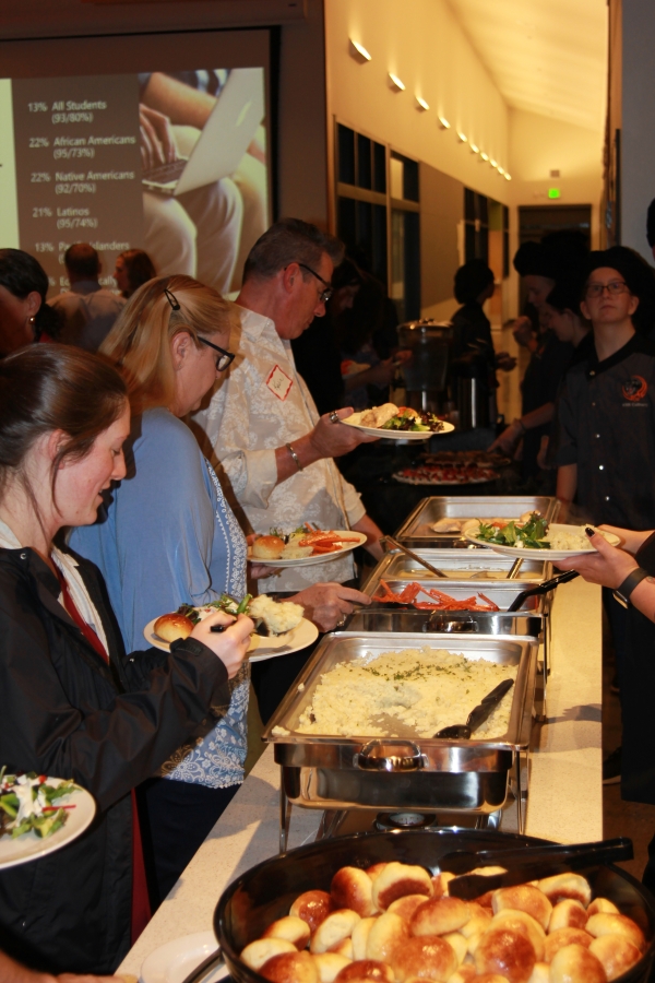 Washougal High School culinary students serve dinner during a &quot;Career Technical Education Business Connection&quot; event at Washougal High School on Thursday, Oct. 17.