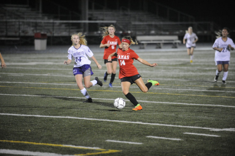 Camas High School sophomore forward Kiya Gramps takes a shot on goal during the Papermakers&#039; 4-0 victory over Heritage High School on Oct. 17.