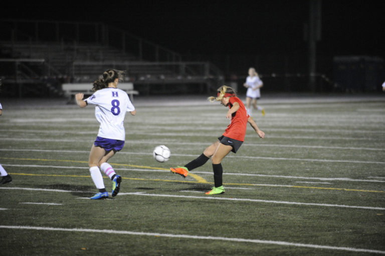 Camas High School sophomore forward Kiya Gramps scores a goal against Heritage High School on Oct. 17 at Doc Harris Stadium in Camas.