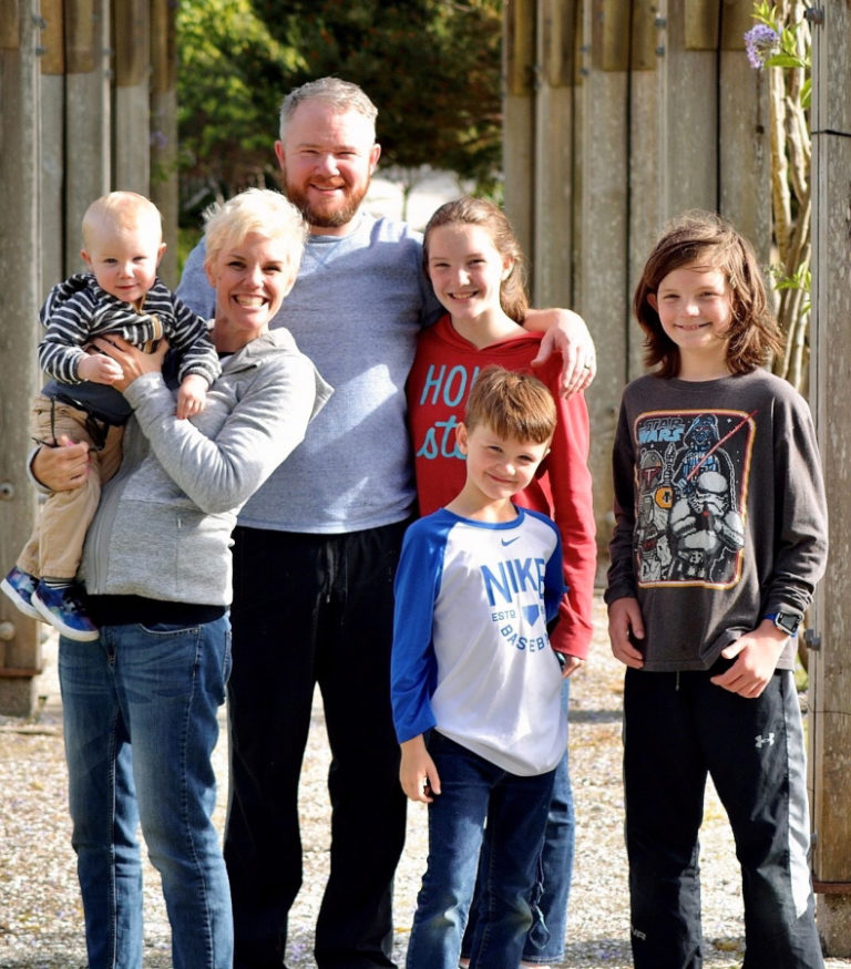 Barry McDonnell, a write-in candidate for the Camas mayoral seat, poses with his wife, Anastasia, and their four children in October 2019.