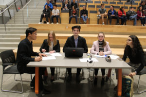 Members of the Youth Advisory Council prepare for the beginning of the group's candidate forum, held Oct. 24 at Discovery High School in Camas. Pictured from left to right are Victor Wu, 17; Lily Dozier, 18; Walter Scholdorf, 17; Ingrid Larsen, 16; and Julia Bintz, 17.
