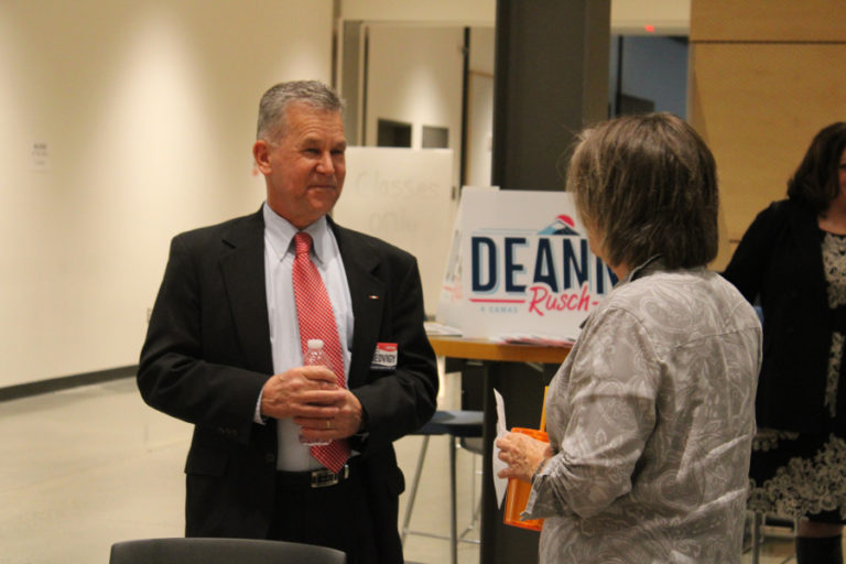 Clark County Council member Gary Medvigy (left) speaks to Camas City Council candidate Shannon Robers (right) at the Oct.