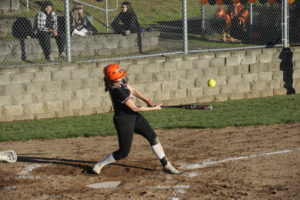 Washougal High School sophomore Peyton Robb records a base hit during the Panthers' 9-5 win over Mark Morris High School in the opening game of the 4A District tournament on Oct. 23. (Photos by Wayne Havrelly/Post-Record)