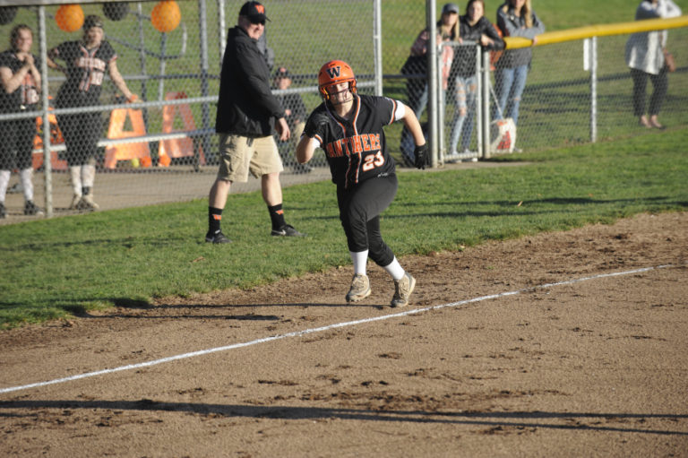 Washougal High School sophomore Peyton Robb swings at a pitch during the Panthers&#039; 9-5 win over Mark Morris High School on Oct.