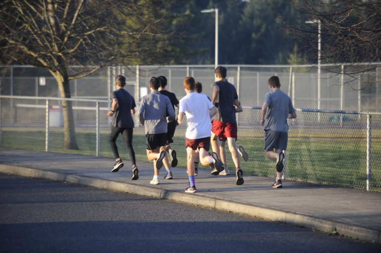 The Camas High School boys cross country team runs during a recent practice session.