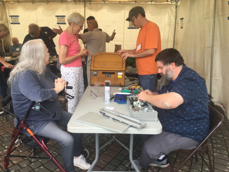 Contributed photo courtesy of Repair Clark County and Columbia Springs 
 Volunteers help residents diagnose and repair broken household items at a Battle Ground Repair Clark County event in early November. 
 The repair group will host a Camas event from noon to 2 p.m., Saturday, Nov. 16, at the Camas library, 625 N.E. Fourth Ave., in downtown Camas. 
 Members of the public can bring knives and other blades in need of sharpening, sewing projects, broken jewelry, bicycles in need of repair and antique or modern household appliances and electronics. Volunteers will diagnose the repair problem and attempt to repair the items during the event.