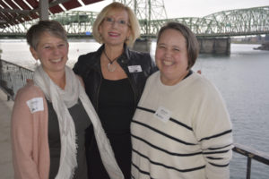 Gause Elementary School booster Rona Ager (left), Washougal School District superintendent Mary Templeton (middle) and Jemtegaard Middle School art teacher Dani Allen pose for a photograph during an Oct. 17 reception to honor the Learn Here Project's "Real Heroes of Clark County." (Contributed photo courtesy of Washougal School District)