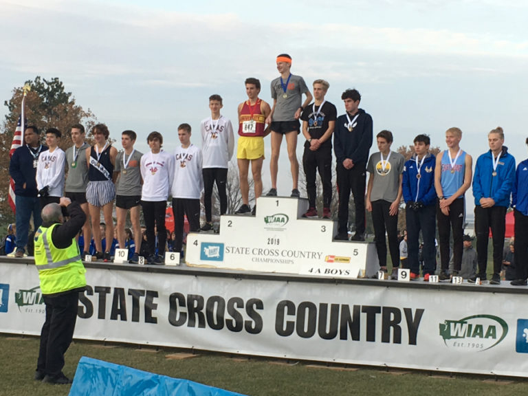 Five Camas High School runners stand on the podium at the state cross country championships in Pasco on Nov. 9.