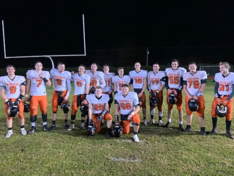 Washougal High School football players pose for a photograph after beating W.F. West High School on Nov. 8 to earn the program&#039;s first state tournament berth since 1999.