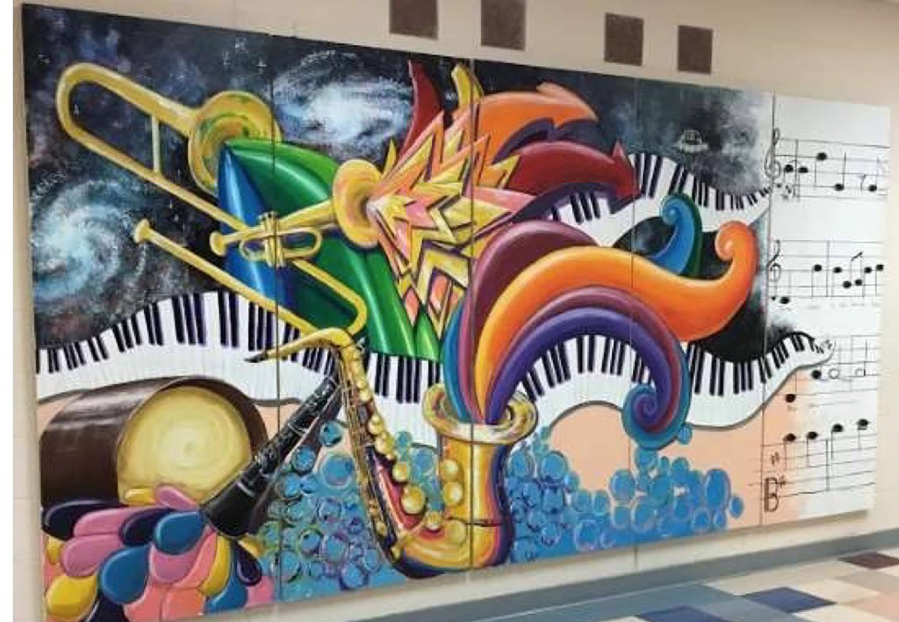 A mural created by Camas High School freshman Tara Hansen incorporating a visual interpretation of sound, music and the "feeling of jazz" decorates the side of Skyridge Middle School. (contributed photo courtesy of Jane deForest Hansen)