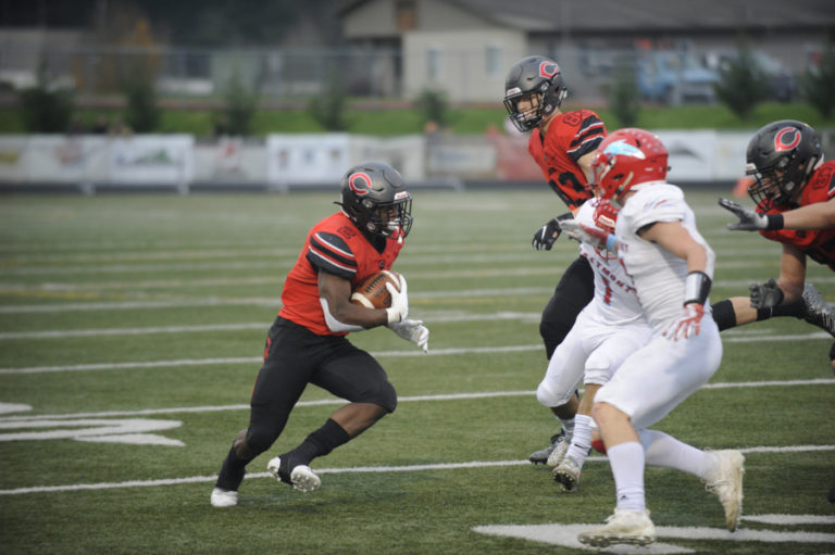 Camas High School junior running back Jacques Badolato-Birdsell makes a cut on a long run against Eastmont High School on Nov. 16.  Badolato-Birdsell scored three touchdowns in his first game back from an injured ankle.