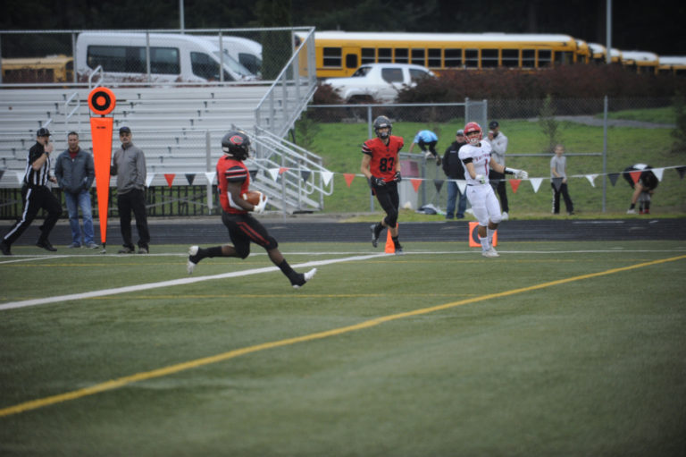 Camas High School junior Jacques Badolato-Birdsell scores a touchdown on Nov. 16 at Doc Harris Stadium.